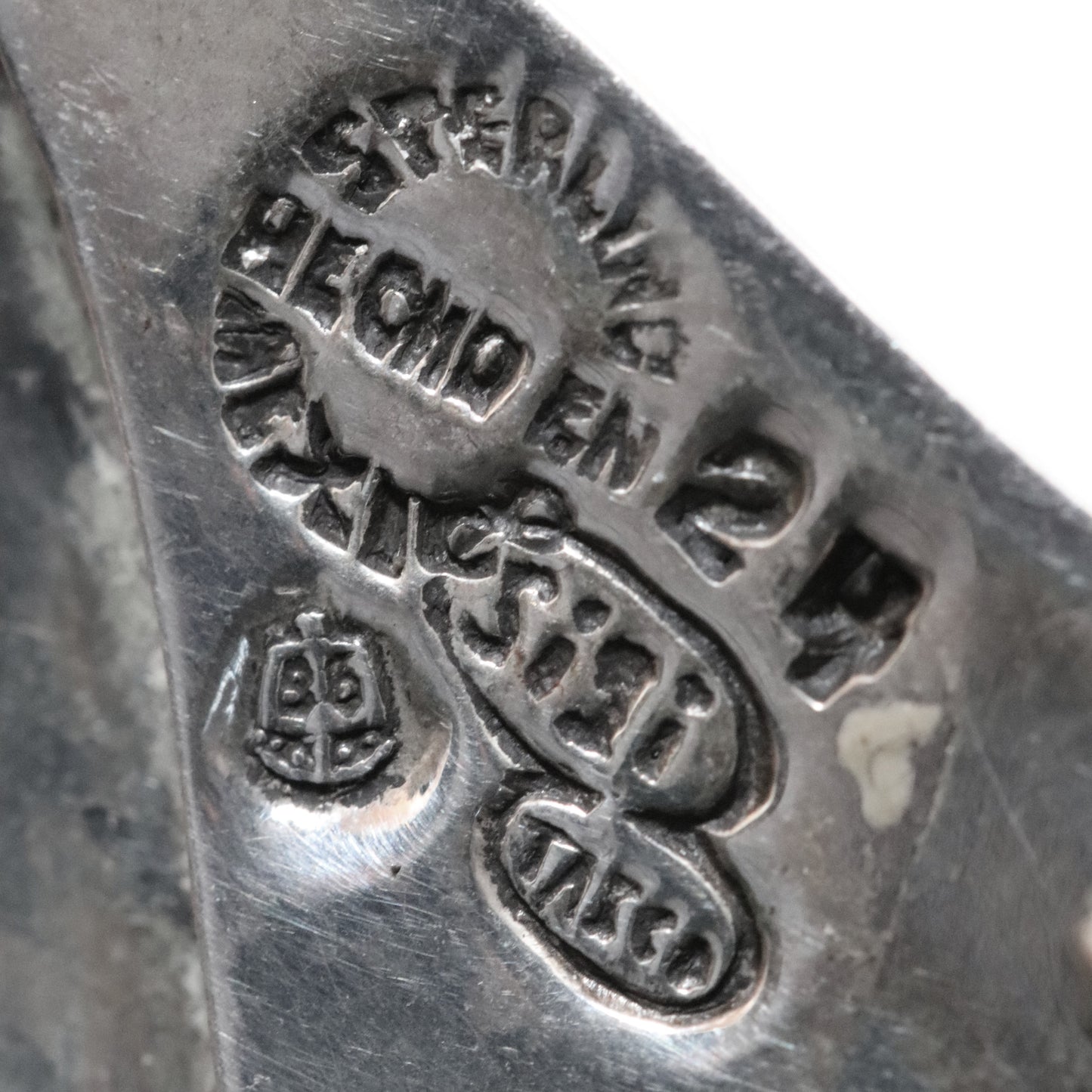 Sigi Pineda Taxco maker's mark on sterling silver abstract brooch close-up
