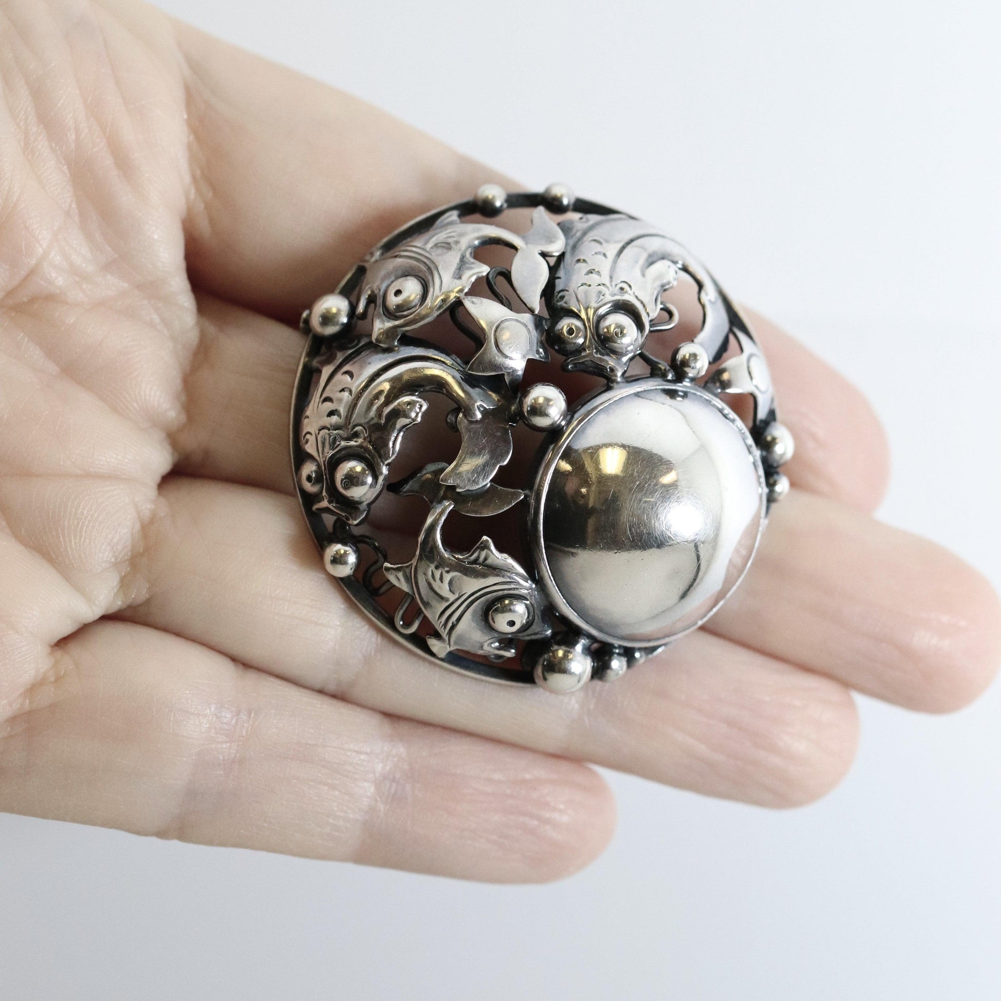 Vintage NE From Sterling Silver Jewelry | Round Silver Cabochon Fish Brooch - Carmel Fine Silver Jewelry