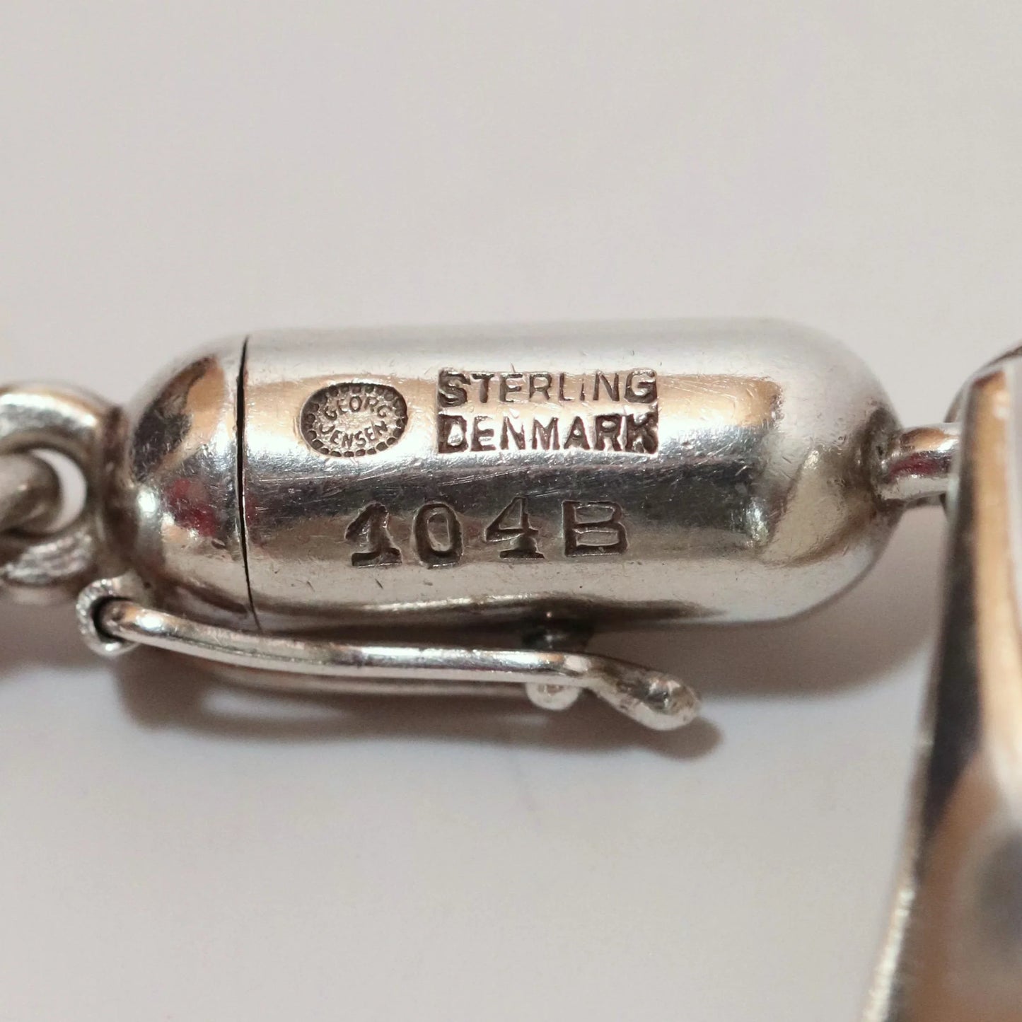 Georg Jensen vintage silver bracelet close-up showing hallmark and 104B clasp details