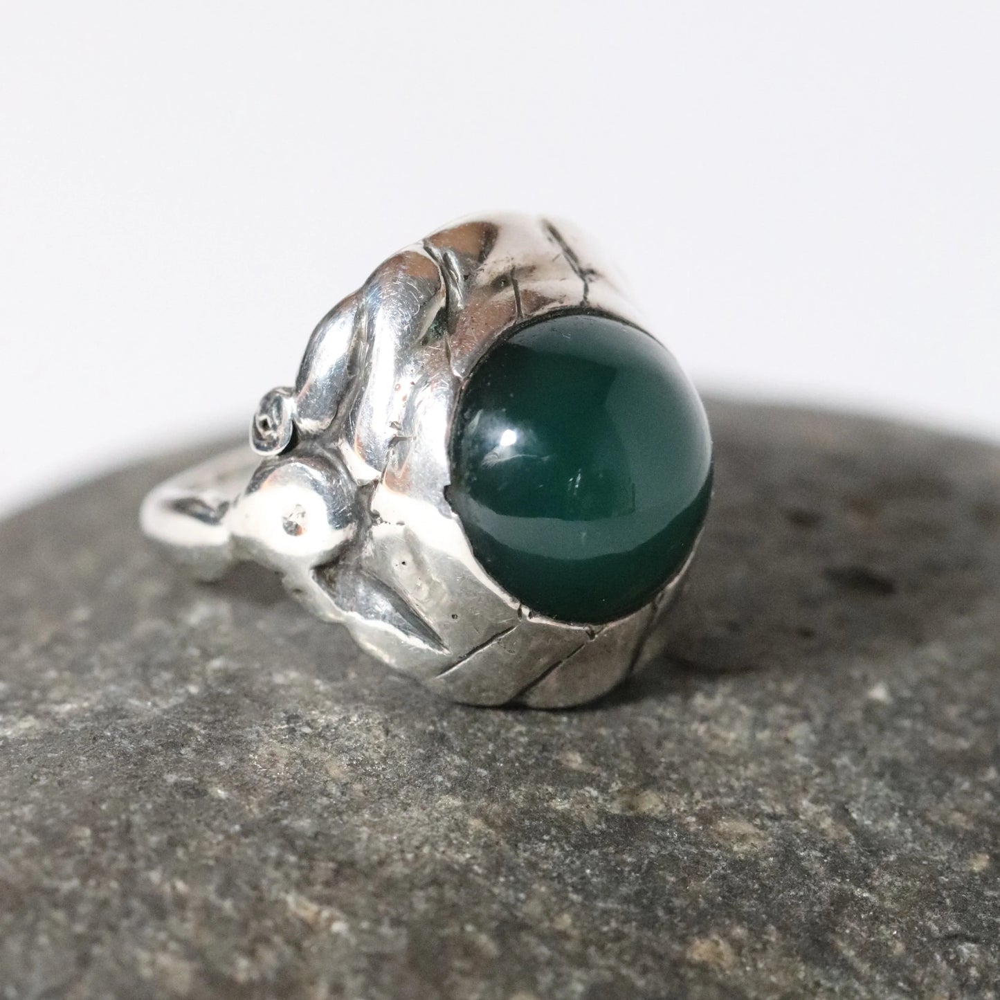 Georg Jensen vintage silver ring with green stone cabochon, artisan designer jewelry close-up