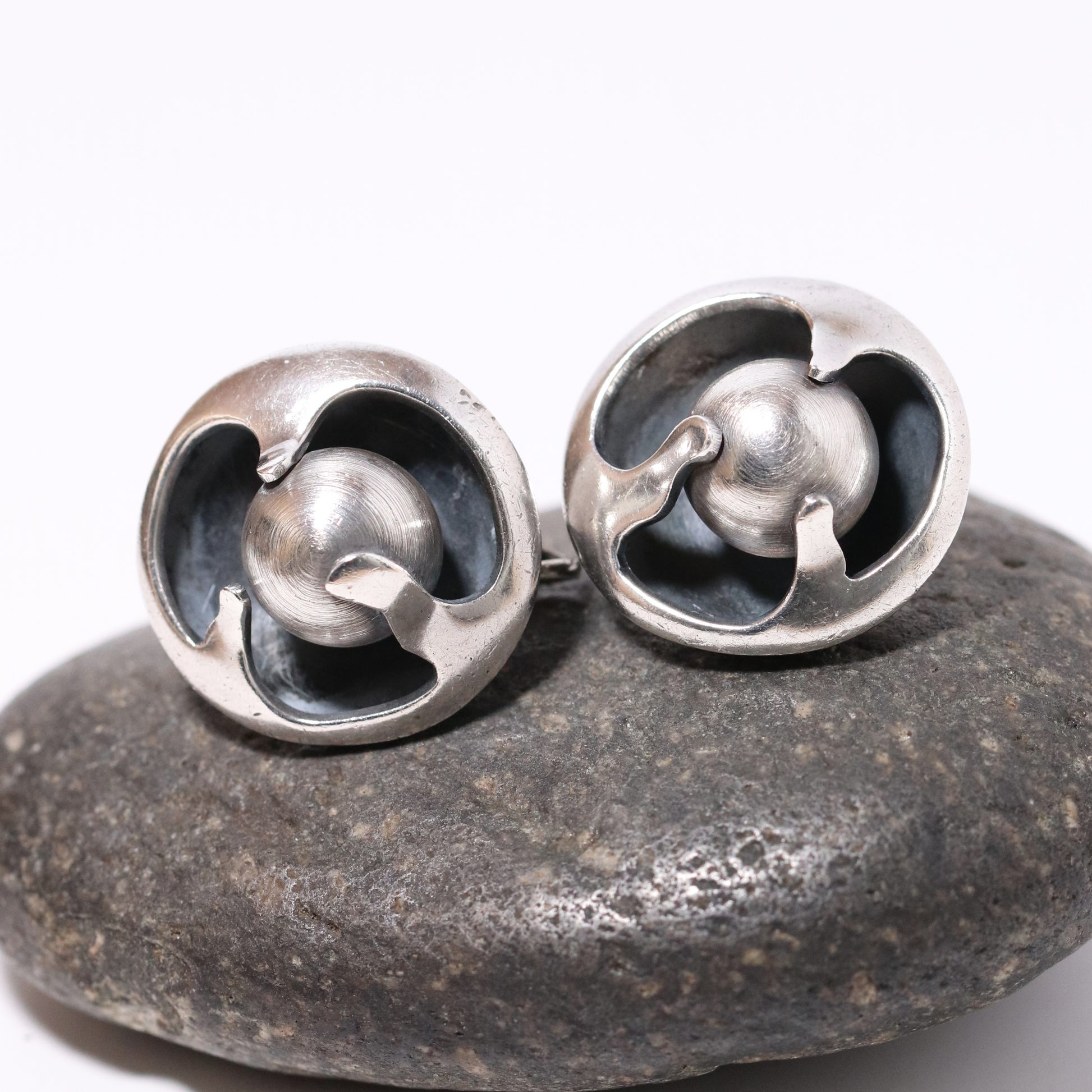 Sigi Pineda Taxco large encased ball silver earrings with modernist design on stone
