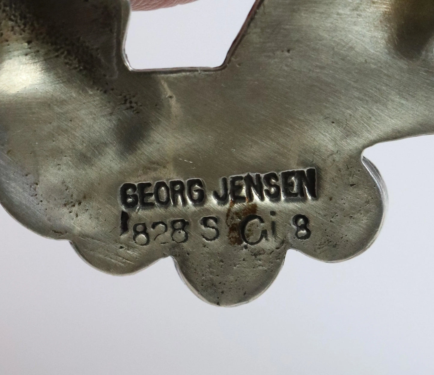 Georg Jensen antique silver brooch hallmark closeup on metal jewelry back