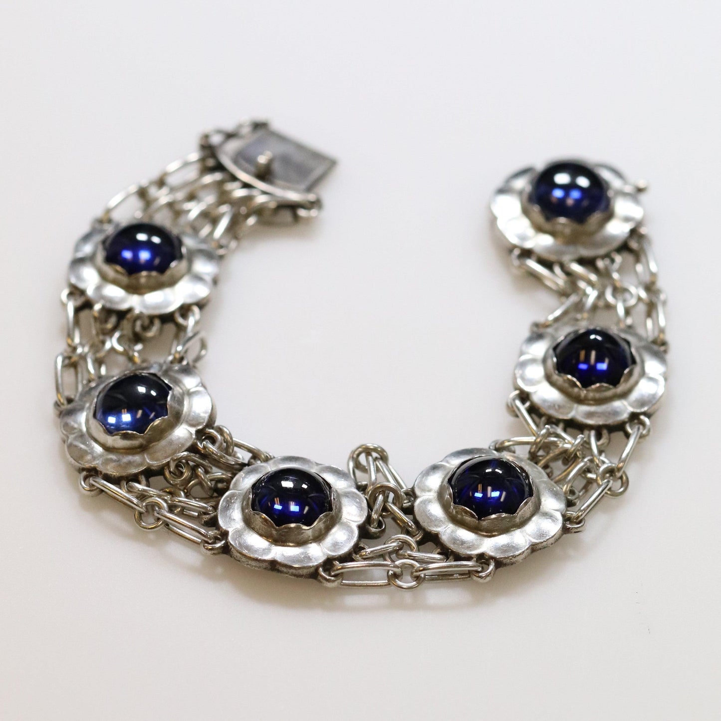 SOLD OUT: ESTATE GEORG JENSEN SYNTHETIC SAPPHIRE FLORAL BRACELET 31 - Carmel FSJ