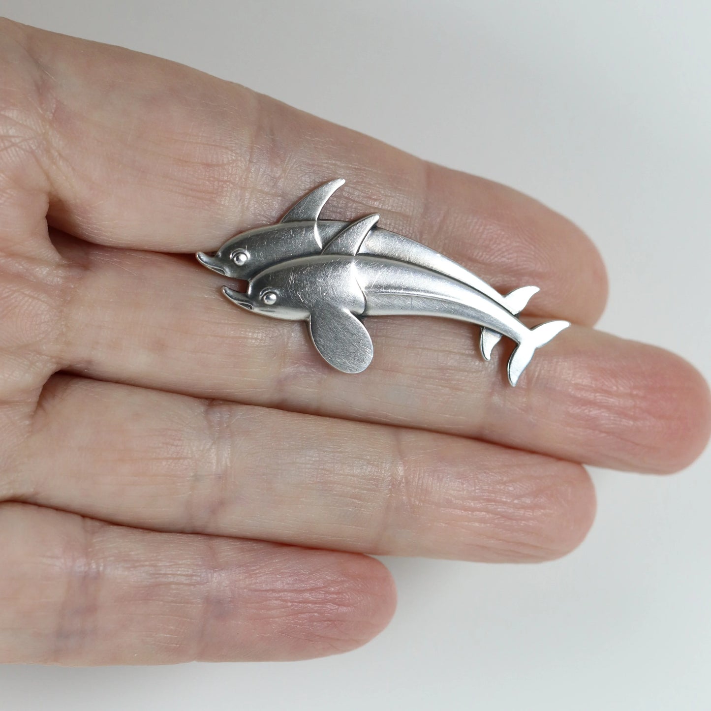 SOLD OUT: Vintage Georg Jensen Jewelry | Dual Dolphin Brooch 317 - Carmel Fine Silver Jewelry