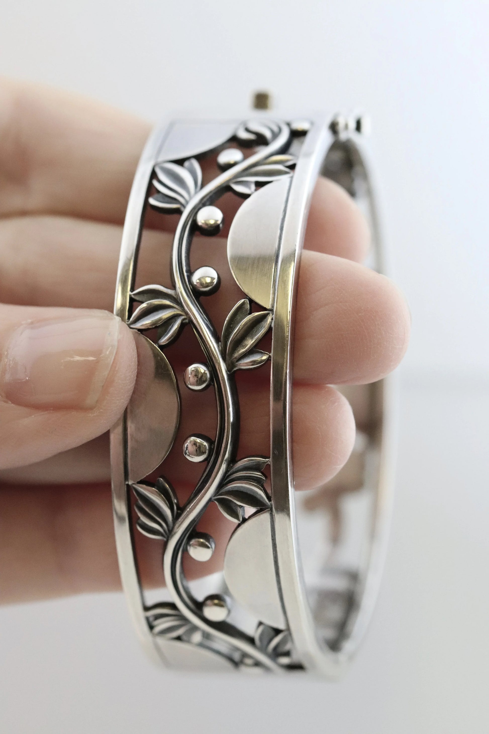 SOLD OUT: Vintage Georg Jensen Jewelry | Harald Nielsen Vine and Berry Hinged Bangle 66 - Carmel Fine Silver Jewelry