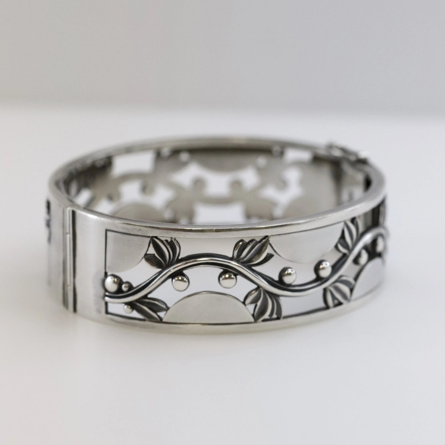 SOLD OUT: Vintage Georg Jensen Jewelry | Harald Nielsen Vine and Berry Hinged Bangle 66 - Carmel Fine Silver Jewelry