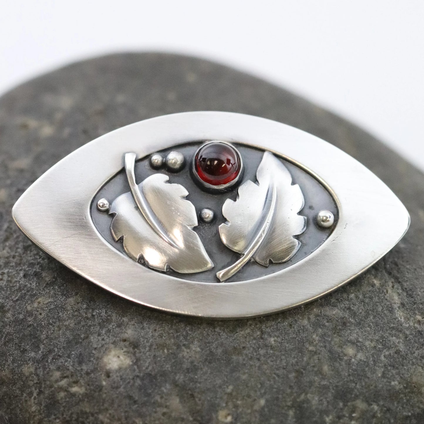 SOLD OUT: Vintage Lawrence Foss Silver Jewelry | Foliate and Garnet Brooch - Carmel Fine Silver Jewelry