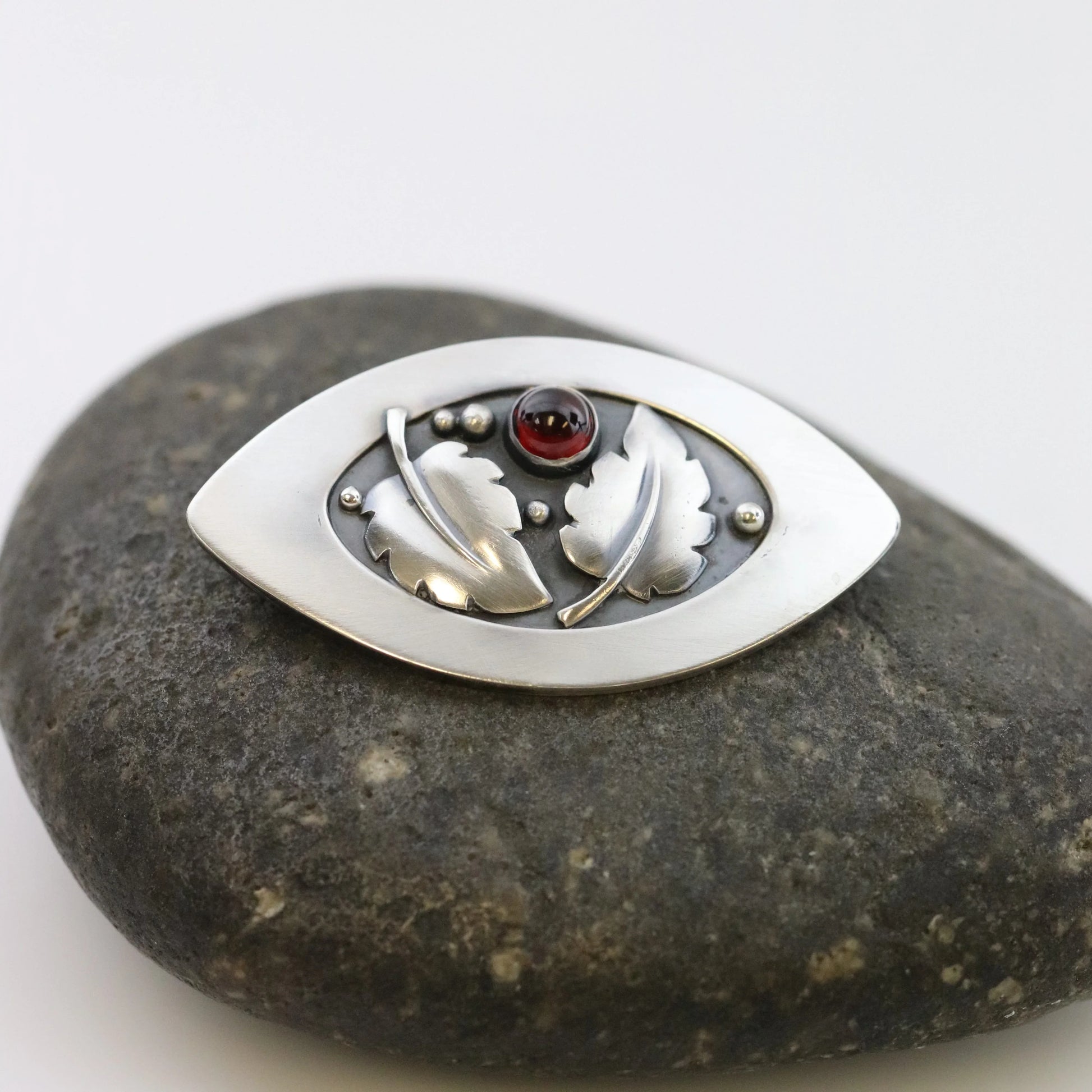 SOLD OUT: Vintage Lawrence Foss Silver Jewelry | Foliate and Garnet Brooch - Carmel Fine Silver Jewelry