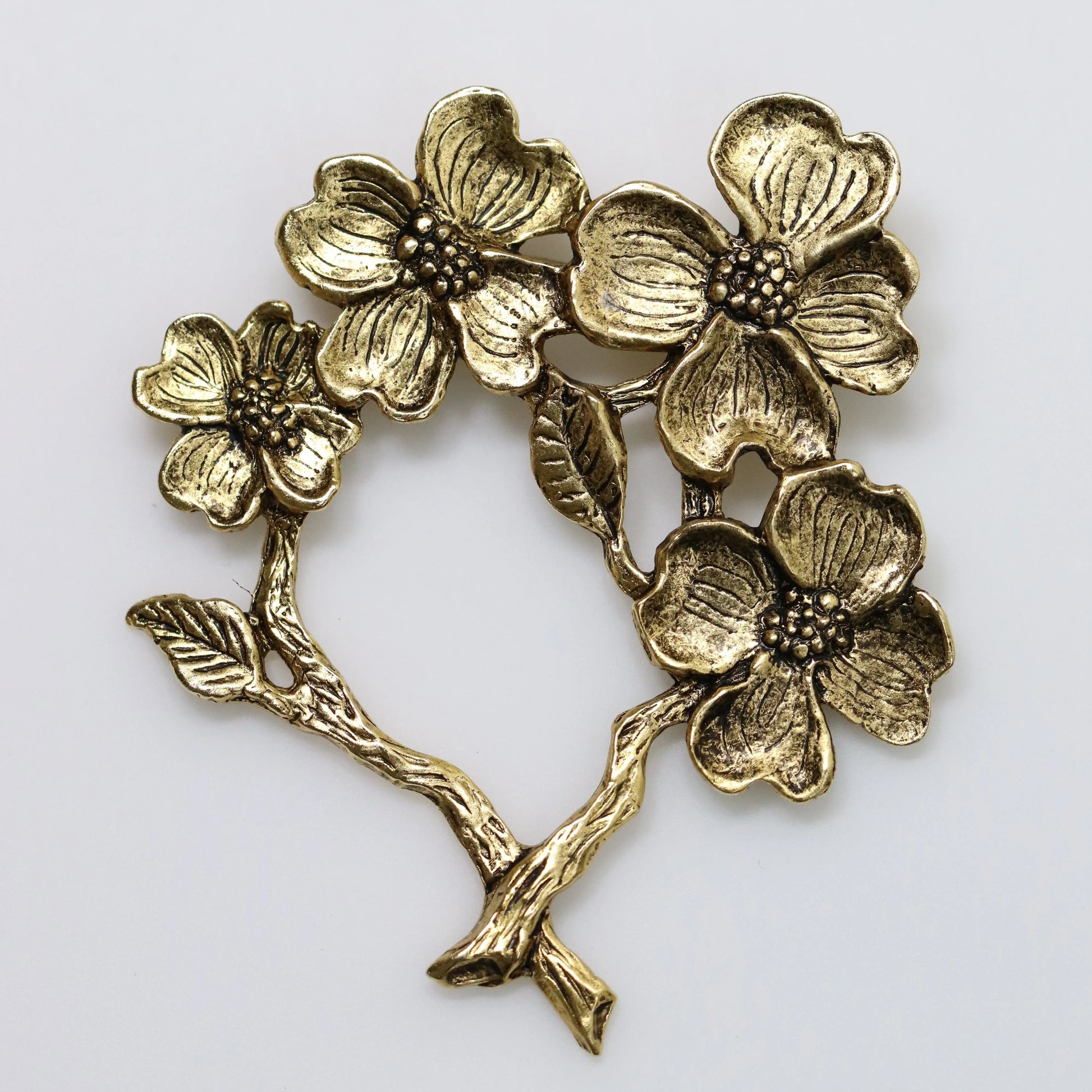 SOLD OUT: Vintage Peggy Yunque Jewelry | Gold Tone Dogwood Floral Brooch - Carmel Fine Silver Jewelry