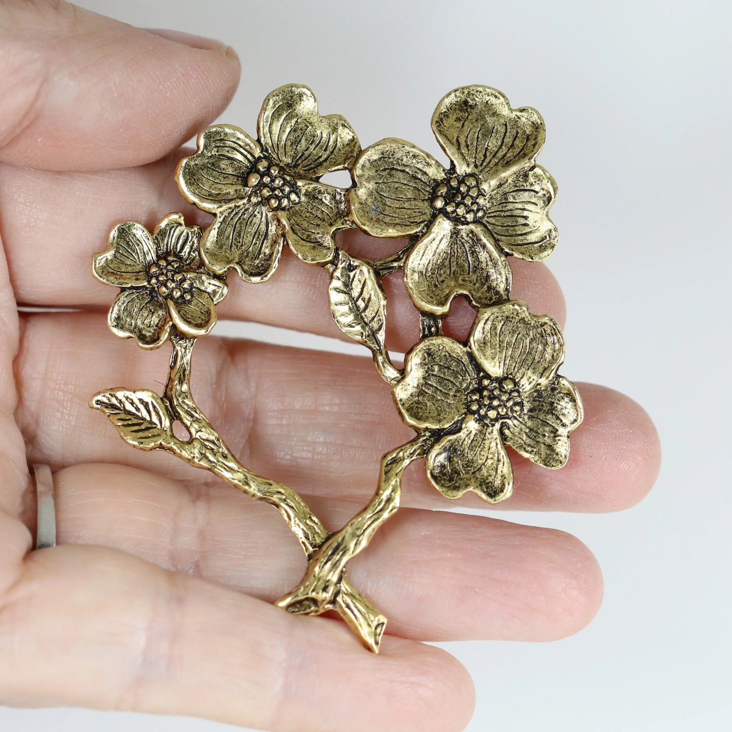 SOLD OUT: Vintage Peggy Yunque Jewelry | Gold Tone Dogwood Floral Brooch - Carmel Fine Silver Jewelry