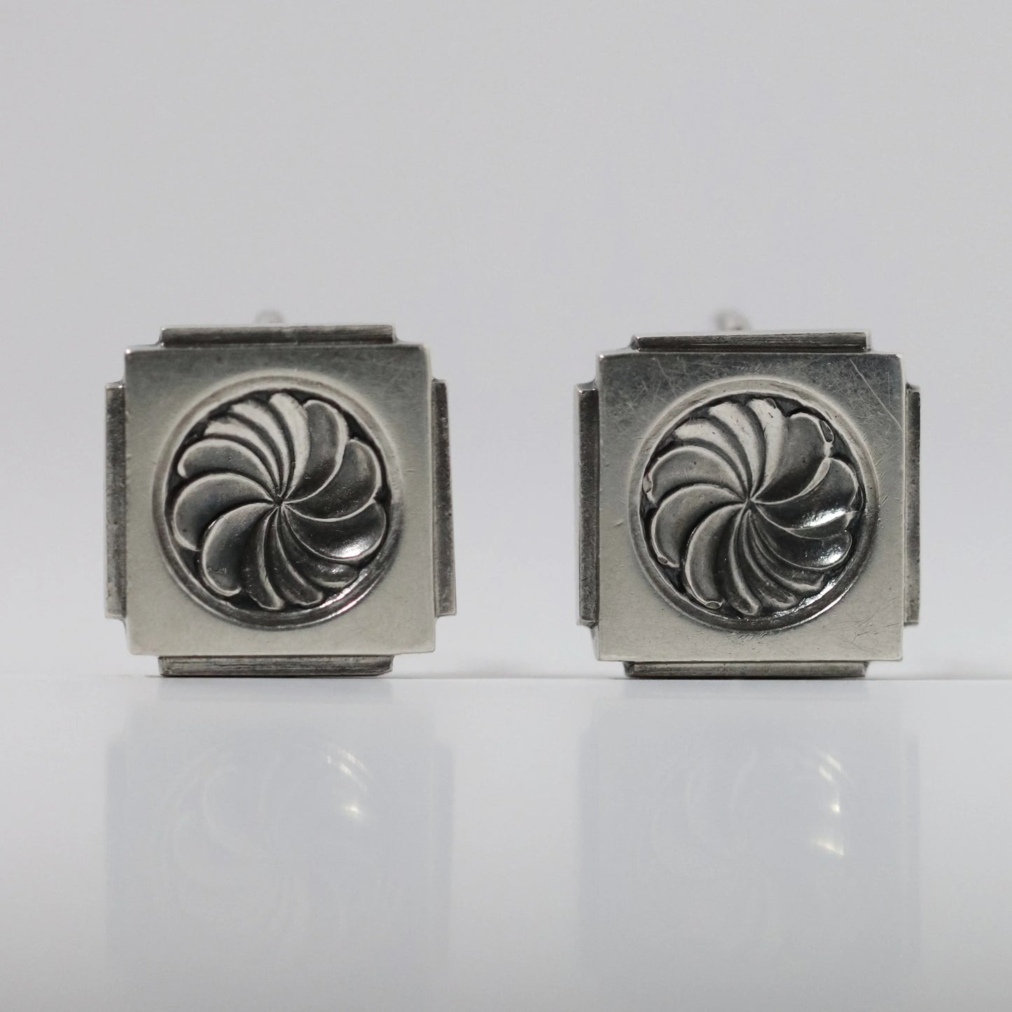 Vintage Georg Jensen Henry Pilstrup silver square earrings with swirl design