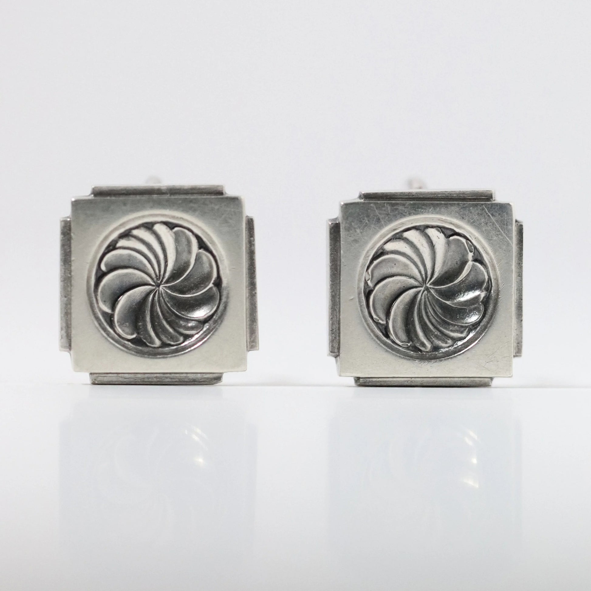Vintage Henry Pilstrup for Georg Jensen silver square earrings with swirl design
