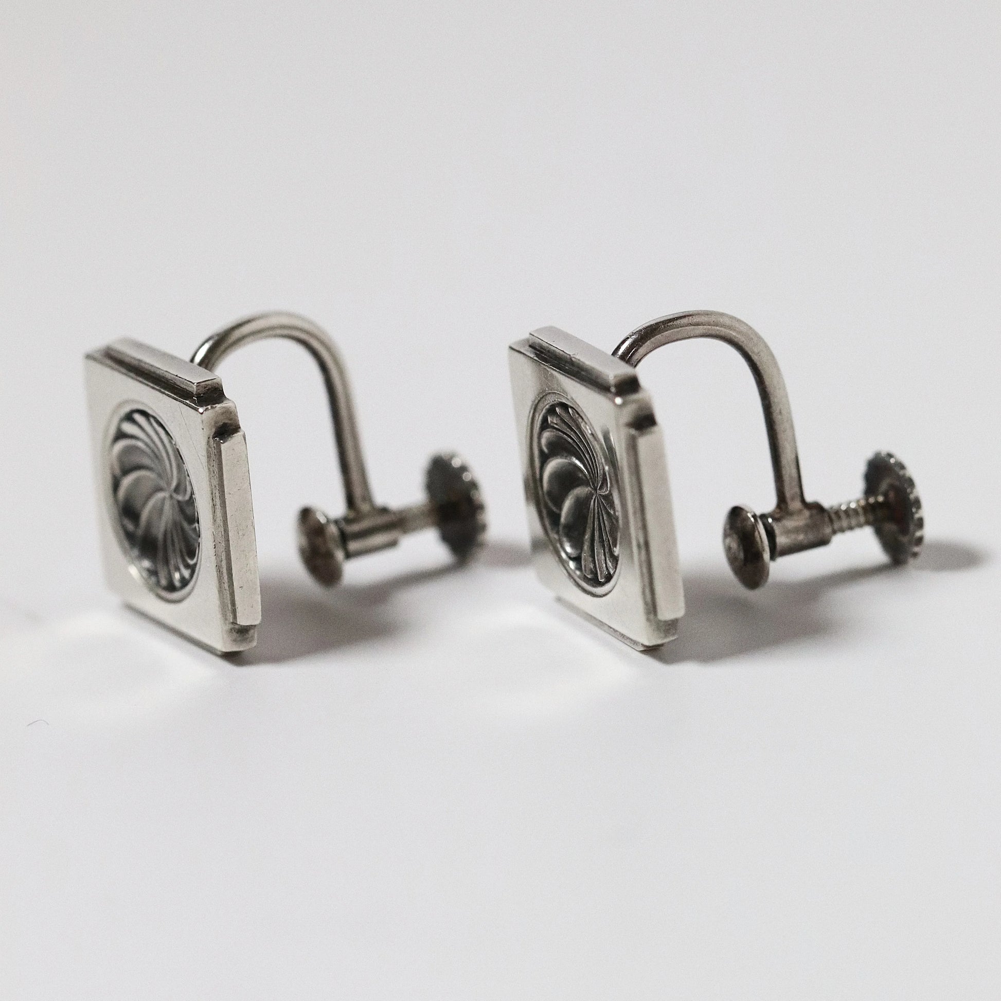 Vintage Henry Pilstrup square silver earrings with screw back design and floral detail