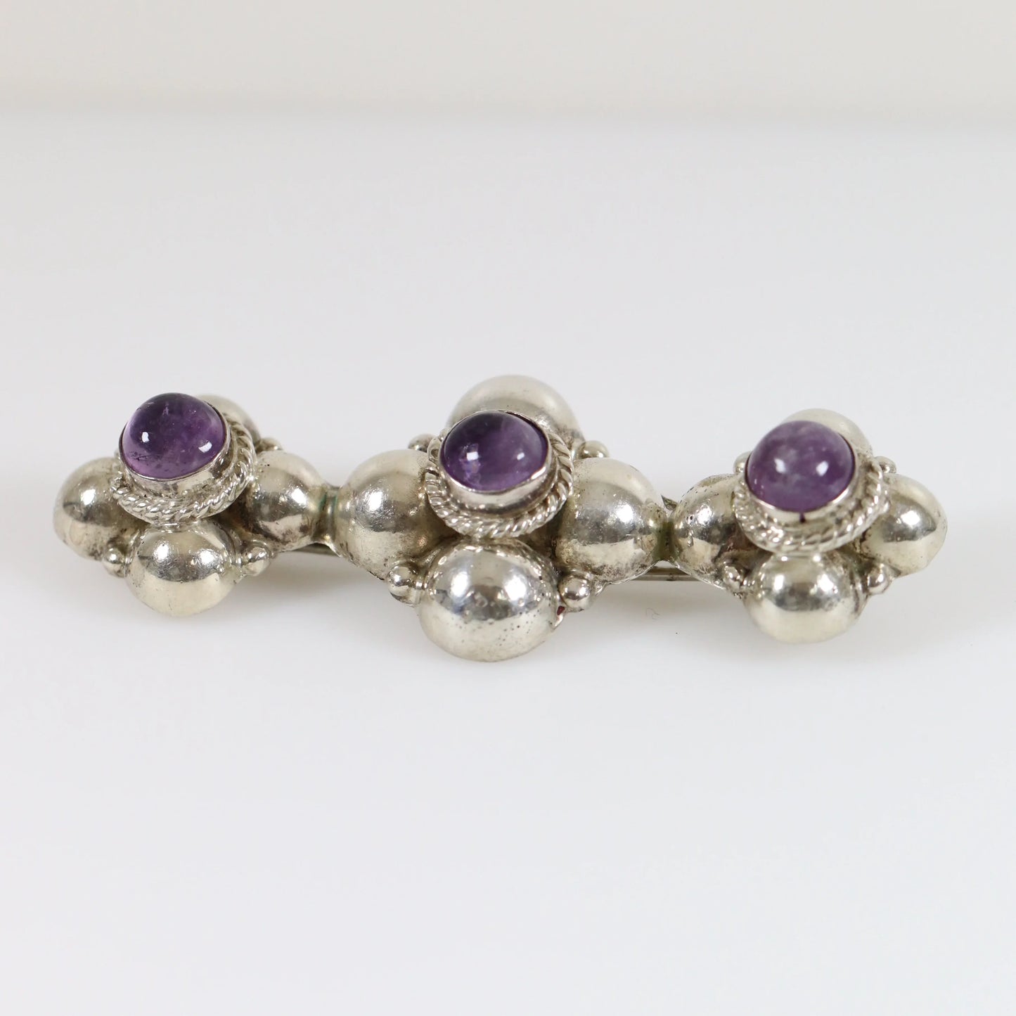 Vintage Silver Mexican Jewelry | Early Century Amethyst Brooch - Carmel Fine Silver Jewelry
